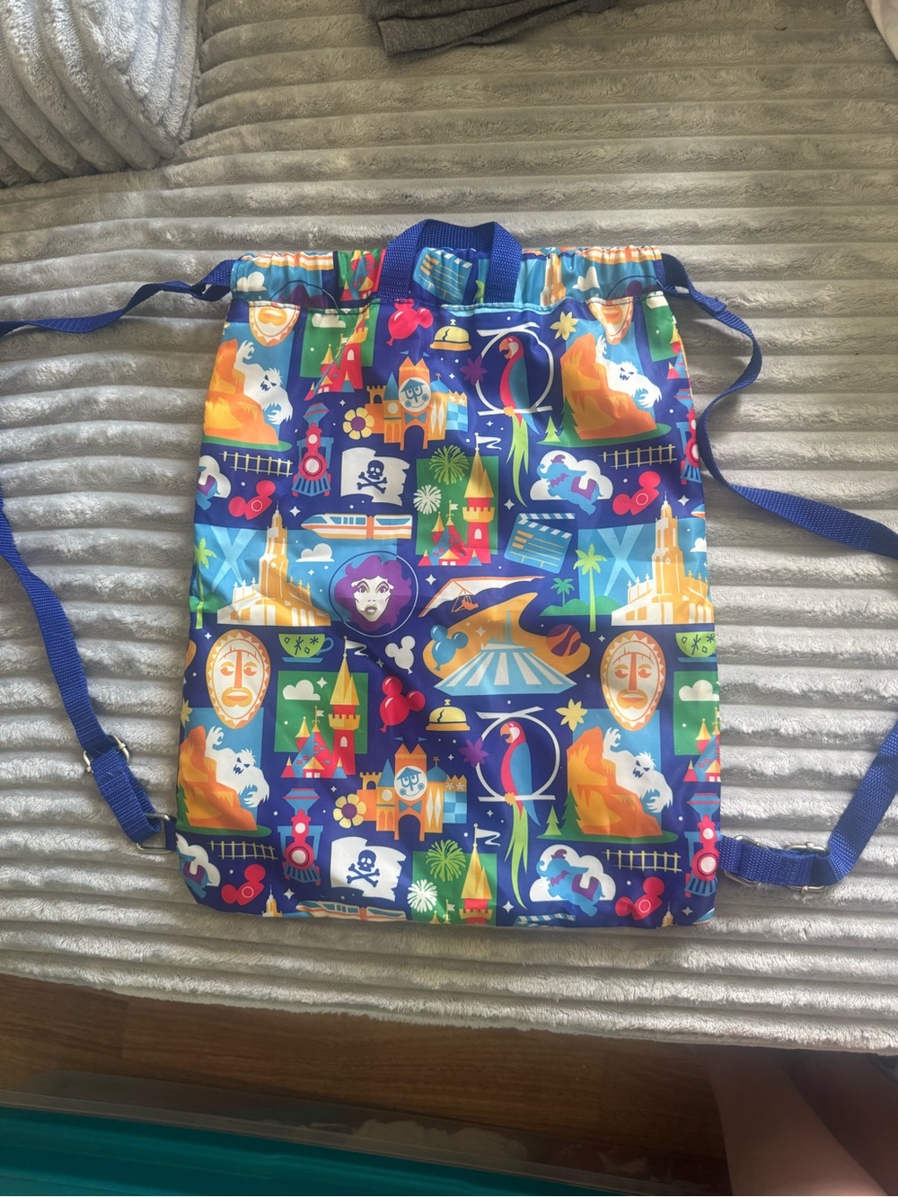 Disney Blue Drawstring Backpack with Multicolor Park Icons